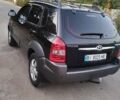 Черный Хендай Туксон, объемом двигателя 2 л и пробегом 221 тыс. км за 8600 $, фото 4 на Automoto.ua