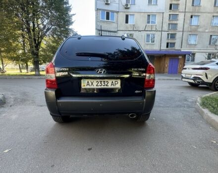 Черный Хендай Туксон, объемом двигателя 2 л и пробегом 228 тыс. км за 7950 $, фото 6 на Automoto.ua