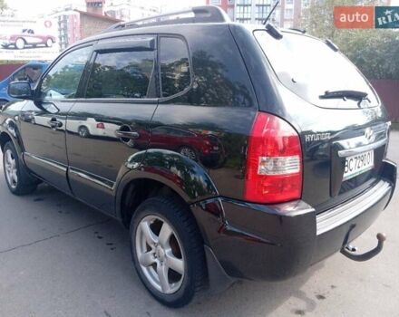Черный Хендай Туксон, объемом двигателя 1.98 л и пробегом 195 тыс. км за 6981 $, фото 10 на Automoto.ua