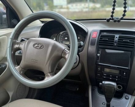 Черный Хендай Туксон, объемом двигателя 2 л и пробегом 353 тыс. км за 6800 $, фото 9 на Automoto.ua