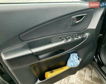 Чорний Хендай Туксон, об'ємом двигуна 2 л та пробігом 225 тис. км за 8000 $, фото 41 на Automoto.ua