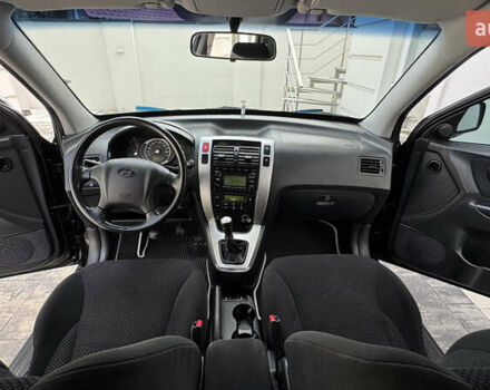 Черный Хендай Туксон, объемом двигателя 2 л и пробегом 67 тыс. км за 9999 $, фото 32 на Automoto.ua