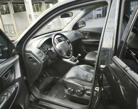 Черный Хендай Туксон, объемом двигателя 1.98 л и пробегом 189 тыс. км за 7800 $, фото 20 на Automoto.ua