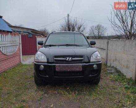 Черный Хендай Туксон, объемом двигателя 2 л и пробегом 237 тыс. км за 7500 $, фото 21 на Automoto.ua