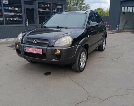 Черный Хендай Туксон, объемом двигателя 2 л и пробегом 255 тыс. км за 8700 $, фото 8 на Automoto.ua
