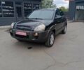 Черный Хендай Туксон, объемом двигателя 2 л и пробегом 255 тыс. км за 8700 $, фото 8 на Automoto.ua