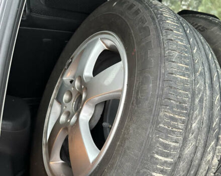 Черный Хендай Туксон, объемом двигателя 2 л и пробегом 136 тыс. км за 8500 $, фото 31 на Automoto.ua