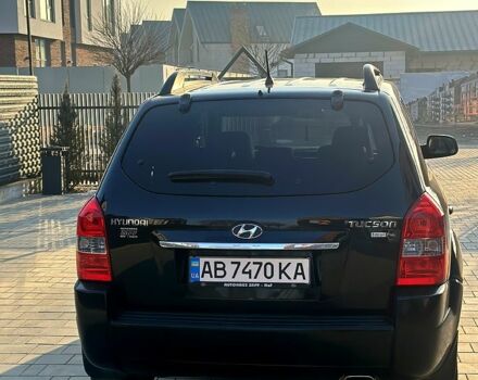 Черный Хендай Туксон, объемом двигателя 2 л и пробегом 225 тыс. км за 8200 $, фото 3 на Automoto.ua