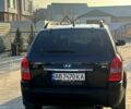 Черный Хендай Туксон, объемом двигателя 2 л и пробегом 225 тыс. км за 8200 $, фото 3 на Automoto.ua