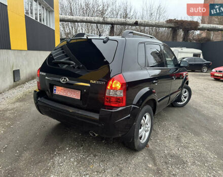 Чорний Хендай Туксон, об'ємом двигуна 2 л та пробігом 243 тис. км за 7999 $, фото 18 на Automoto.ua