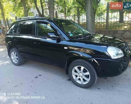 Чорний Хендай Туксон, об'ємом двигуна 1.98 л та пробігом 230 тис. км за 6950 $, фото 7 на Automoto.ua
