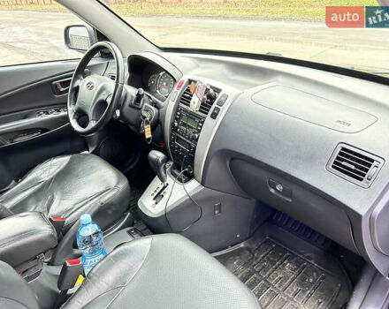 Чорний Хендай Туксон, об'ємом двигуна 2.66 л та пробігом 395 тис. км за 9950 $, фото 16 на Automoto.ua