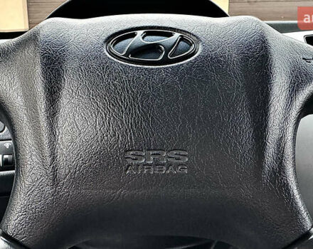 Чорний Хендай Туксон, об'ємом двигуна 2 л та пробігом 182 тис. км за 8299 $, фото 65 на Automoto.ua