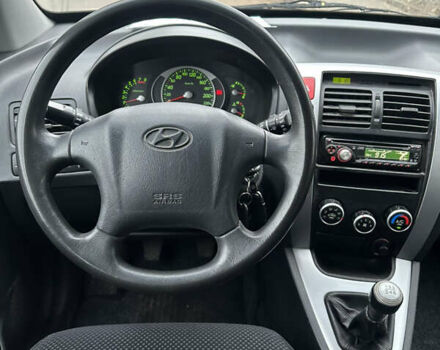 Черный Хендай Туксон, объемом двигателя 2 л и пробегом 136 тыс. км за 8500 $, фото 29 на Automoto.ua