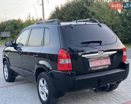 Черный Хендай Туксон, объемом двигателя 2 л и пробегом 250 тыс. км за 7950 $, фото 10 на Automoto.ua