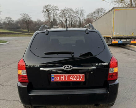 Черный Хендай Туксон, объемом двигателя 2 л и пробегом 210 тыс. км за 7850 $, фото 15 на Automoto.ua