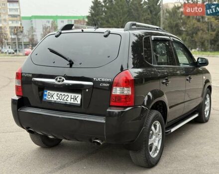 Черный Хендай Туксон, объемом двигателя 1.99 л и пробегом 240 тыс. км за 7200 $, фото 18 на Automoto.ua