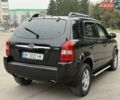 Черный Хендай Туксон, объемом двигателя 1.99 л и пробегом 240 тыс. км за 7200 $, фото 18 на Automoto.ua