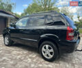 Черный Хендай Туксон, объемом двигателя 2 л и пробегом 218 тыс. км за 8700 $, фото 20 на Automoto.ua
