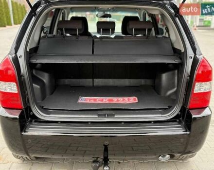 Черный Хендай Туксон, объемом двигателя 1.98 л и пробегом 239 тыс. км за 8700 $, фото 13 на Automoto.ua