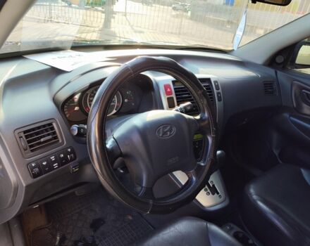 Черный Хендай Туксон, объемом двигателя 2 л и пробегом 82 тыс. км за 7490 $, фото 16 на Automoto.ua