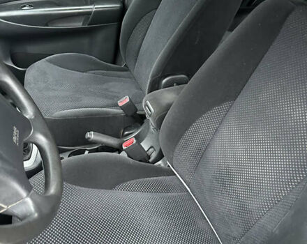 Черный Хендай Туксон, объемом двигателя 2 л и пробегом 136 тыс. км за 8500 $, фото 17 на Automoto.ua