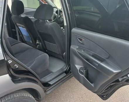 Черный Хендай Туксон, объемом двигателя 2 л и пробегом 168 тыс. км за 9000 $, фото 46 на Automoto.ua