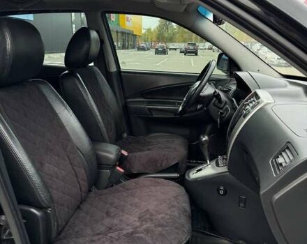 Черный Хендай Туксон, объемом двигателя 1.98 л и пробегом 202 тыс. км за 8350 $, фото 13 на Automoto.ua