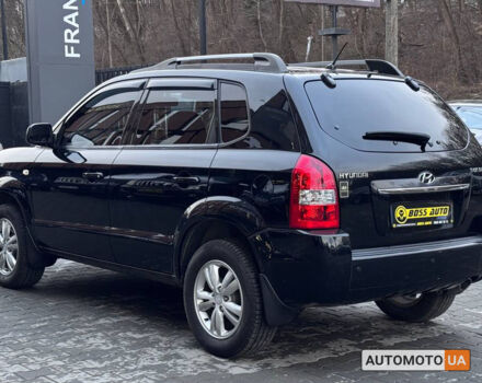 Черный Хендай Туксон, объемом двигателя 2 л и пробегом 170 тыс. км за 9200 $, фото 3 на Automoto.ua