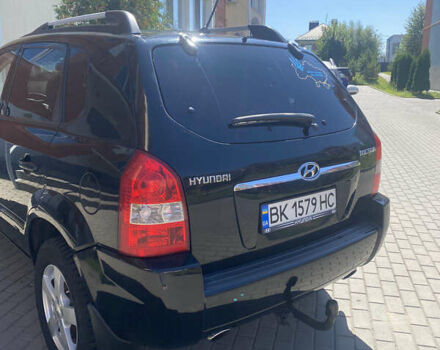 Чорний Хендай Туксон, об'ємом двигуна 1.99 л та пробігом 230 тис. км за 8000 $, фото 3 на Automoto.ua