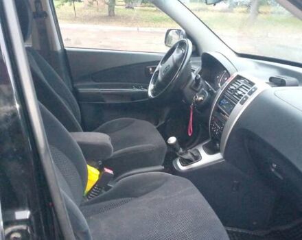 Чорний Хендай Туксон, об'ємом двигуна 2 л та пробігом 225 тис. км за 7850 $, фото 2 на Automoto.ua