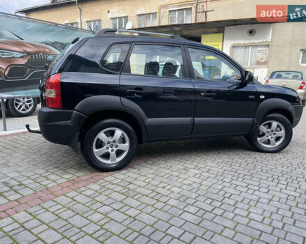 Черный Хендай Туксон, объемом двигателя 1.98 л и пробегом 177 тыс. км за 7600 $, фото 7 на Automoto.ua