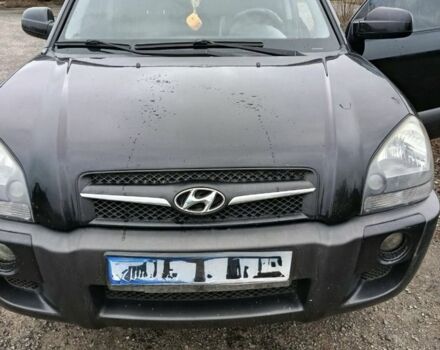 Черный Хендай Туксон, объемом двигателя 2 л и пробегом 276 тыс. км за 8500 $, фото 1 на Automoto.ua