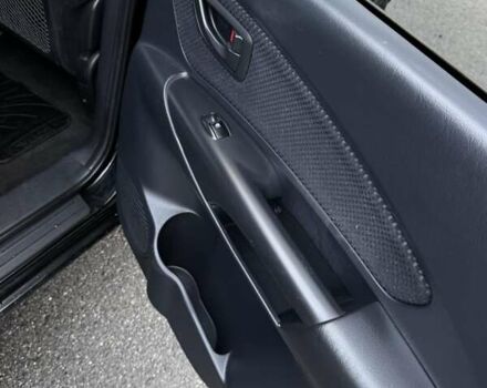 Черный Хендай Туксон, объемом двигателя 2 л и пробегом 253 тыс. км за 8299 $, фото 13 на Automoto.ua