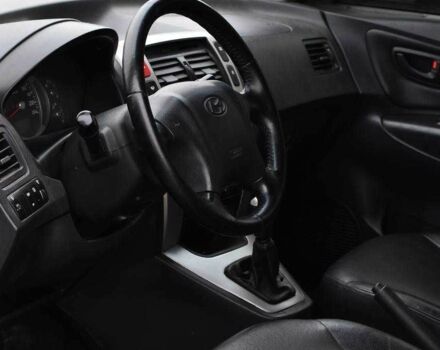 Чорний Хендай Туксон, об'ємом двигуна 2 л та пробігом 204 тис. км за 8650 $, фото 6 на Automoto.ua