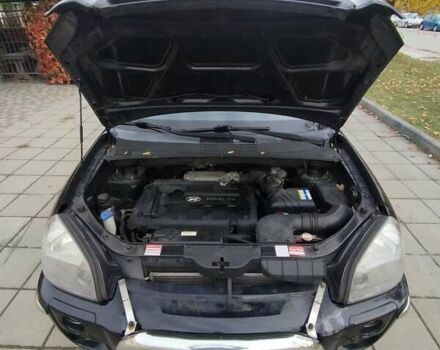 Черный Хендай Туксон, объемом двигателя 1.98 л и пробегом 214 тыс. км за 7700 $, фото 30 на Automoto.ua