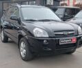 Чорний Хендай Туксон, об'ємом двигуна 2 л та пробігом 192 тис. км за 7990 $, фото 2 на Automoto.ua