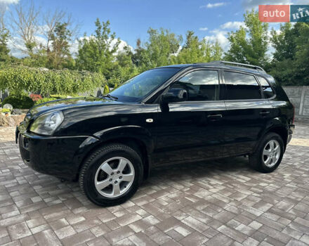 Черный Хендай Туксон, объемом двигателя 2 л и пробегом 218 тыс. км за 8700 $, фото 18 на Automoto.ua