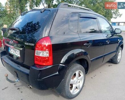 Черный Хендай Туксон, объемом двигателя 1.98 л и пробегом 195 тыс. км за 6981 $, фото 8 на Automoto.ua