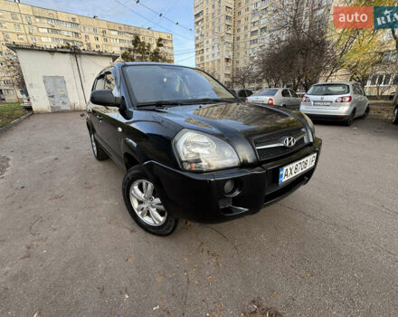 Черный Хендай Туксон, объемом двигателя 1.98 л и пробегом 196 тыс. км за 7999 $, фото 1 на Automoto.ua