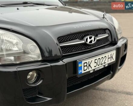 Черный Хендай Туксон, объемом двигателя 1.99 л и пробегом 240 тыс. км за 7200 $, фото 14 на Automoto.ua