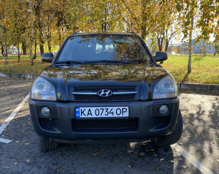 Черный Хендай Туксон, объемом двигателя 1.98 л и пробегом 218 тыс. км за 7200 $, фото 1 на Automoto.ua
