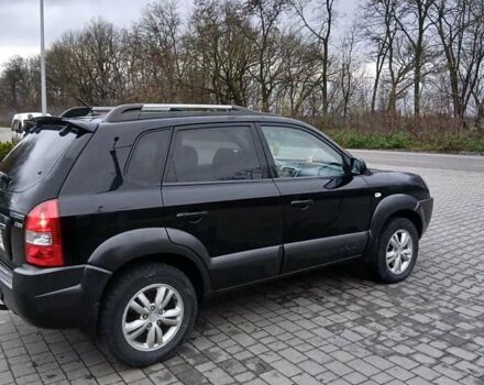 Черный Хендай Туксон, объемом двигателя 2 л и пробегом 230 тыс. км за 8000 $, фото 12 на Automoto.ua