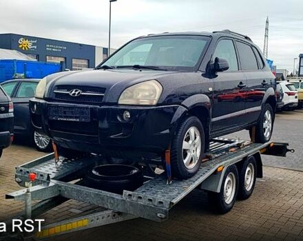 Чорний Хендай Туксон, об'ємом двигуна 2 л та пробігом 226 тис. км за 4720 $, фото 3 на Automoto.ua