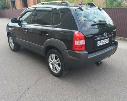 Черный Хендай Туксон, объемом двигателя 2 л и пробегом 168 тыс. км за 9000 $, фото 10 на Automoto.ua