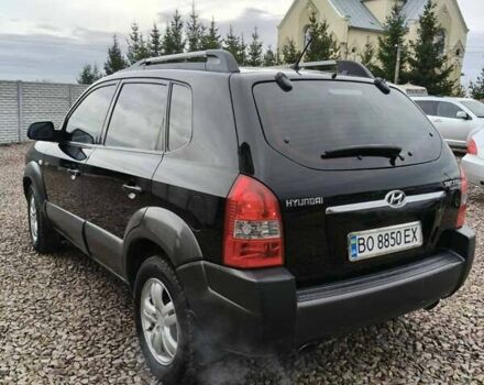 Чорний Хендай Туксон, об'ємом двигуна 2 л та пробігом 185 тис. км за 7499 $, фото 3 на Automoto.ua