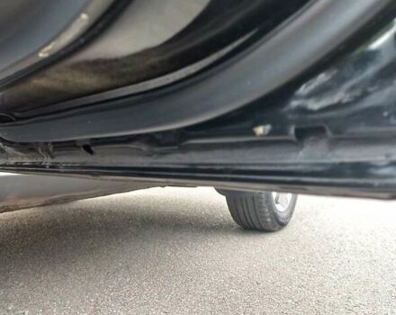 Черный Хендай Туксон, объемом двигателя 2 л и пробегом 168 тыс. км за 9000 $, фото 48 на Automoto.ua