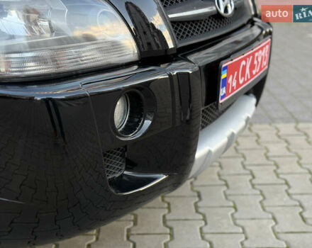 Чорний Хендай Туксон, об'ємом двигуна 2 л та пробігом 156 тис. км за 7850 $, фото 44 на Automoto.ua