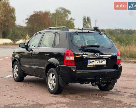 Черный Хендай Туксон, объемом двигателя 2 л и пробегом 361 тыс. км за 6499 $, фото 2 на Automoto.ua