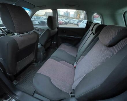 Чорний Хендай Туксон, об'ємом двигуна 2 л та пробігом 110 тис. км за 8750 $, фото 22 на Automoto.ua